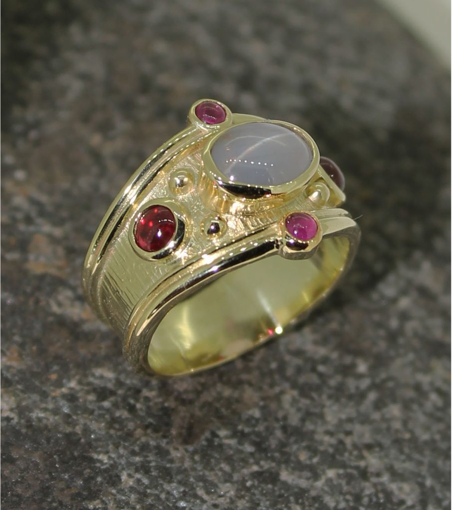 18ct star sapphire and ruby ring